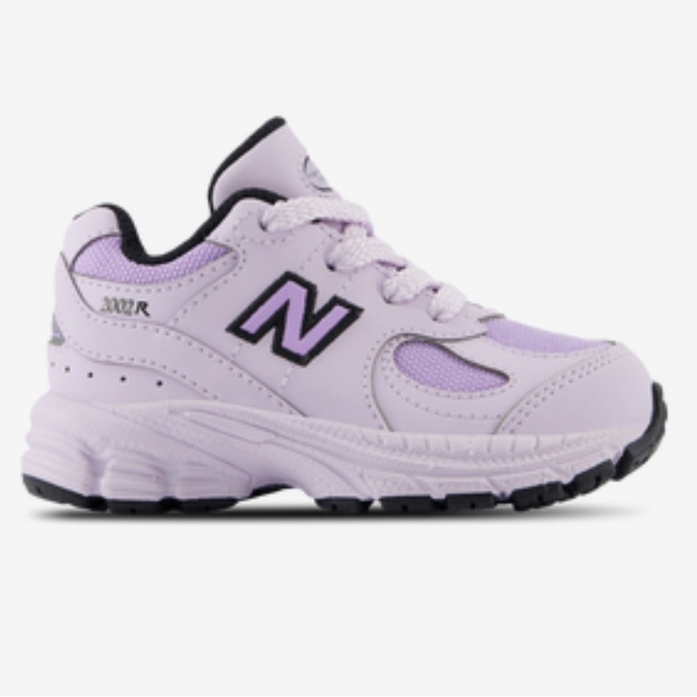 Purple kids new balance 
Brand new never worn